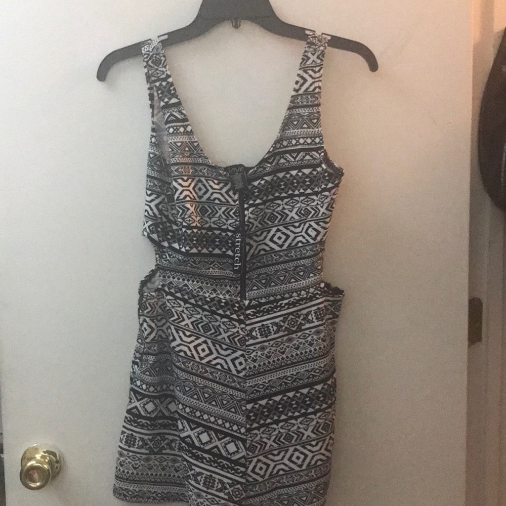 romper  cut out sides to show off your waist.